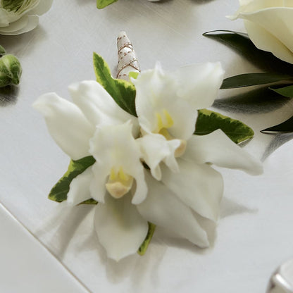 White Mini Cymbidium Boutonniere –  Sammy Wammy Floral, Montgomery IL